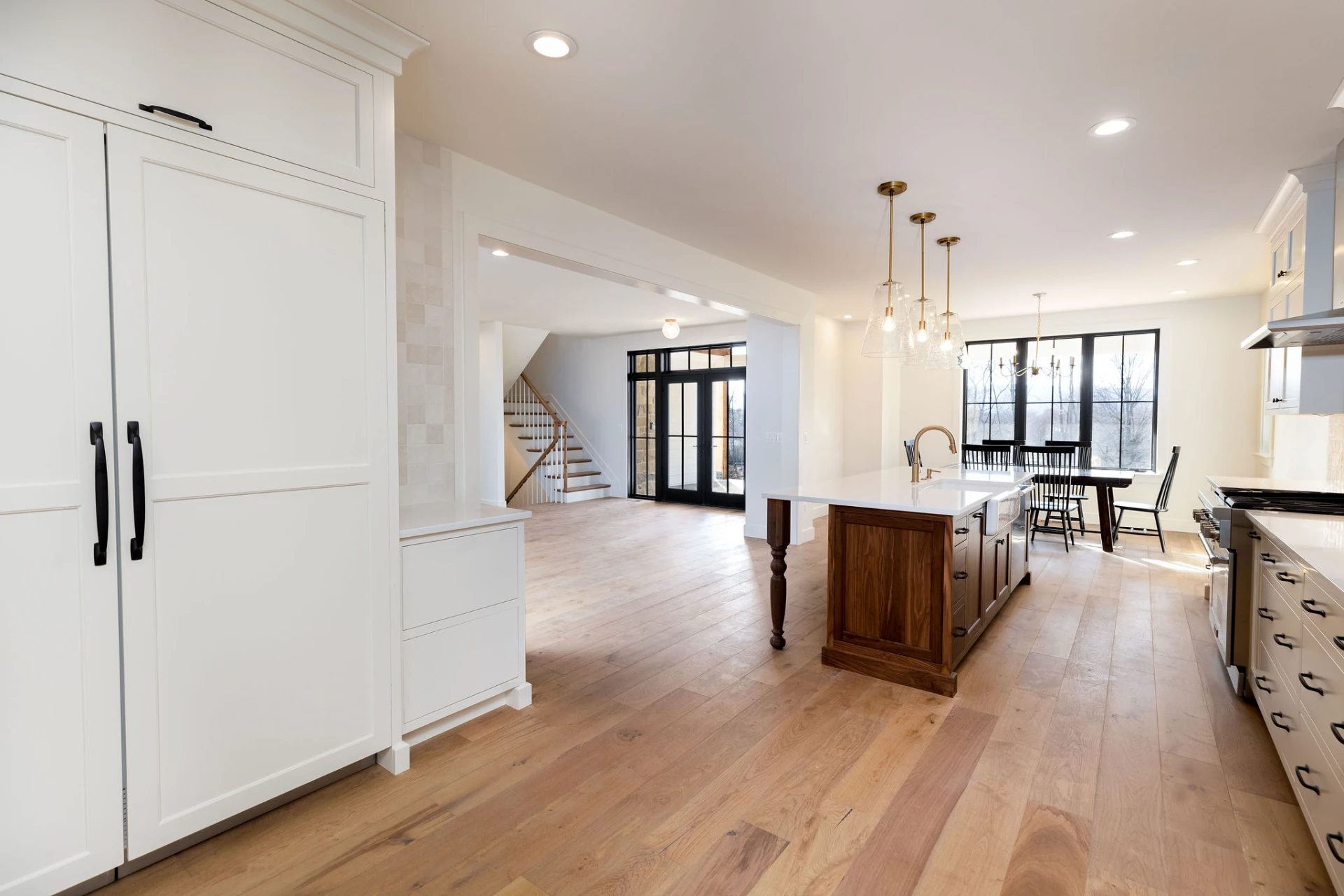 custom-white-kitchen-with-walnut-island-and-wide-plank-flooring-virginia